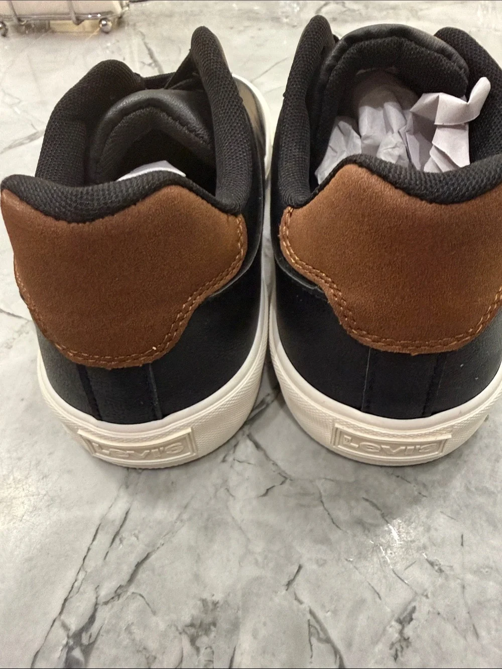 Levi's Men's Black Sneakers with Brown Heel Accent and White Sole